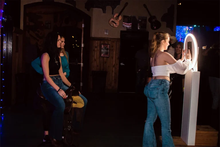 Say cheese at Stampede Houston's photo booth! Capture unforgettable moments with friends and make memories that last a lifetime. It's the perfect addition to your night out in Houston's vibrant nightlife scene.